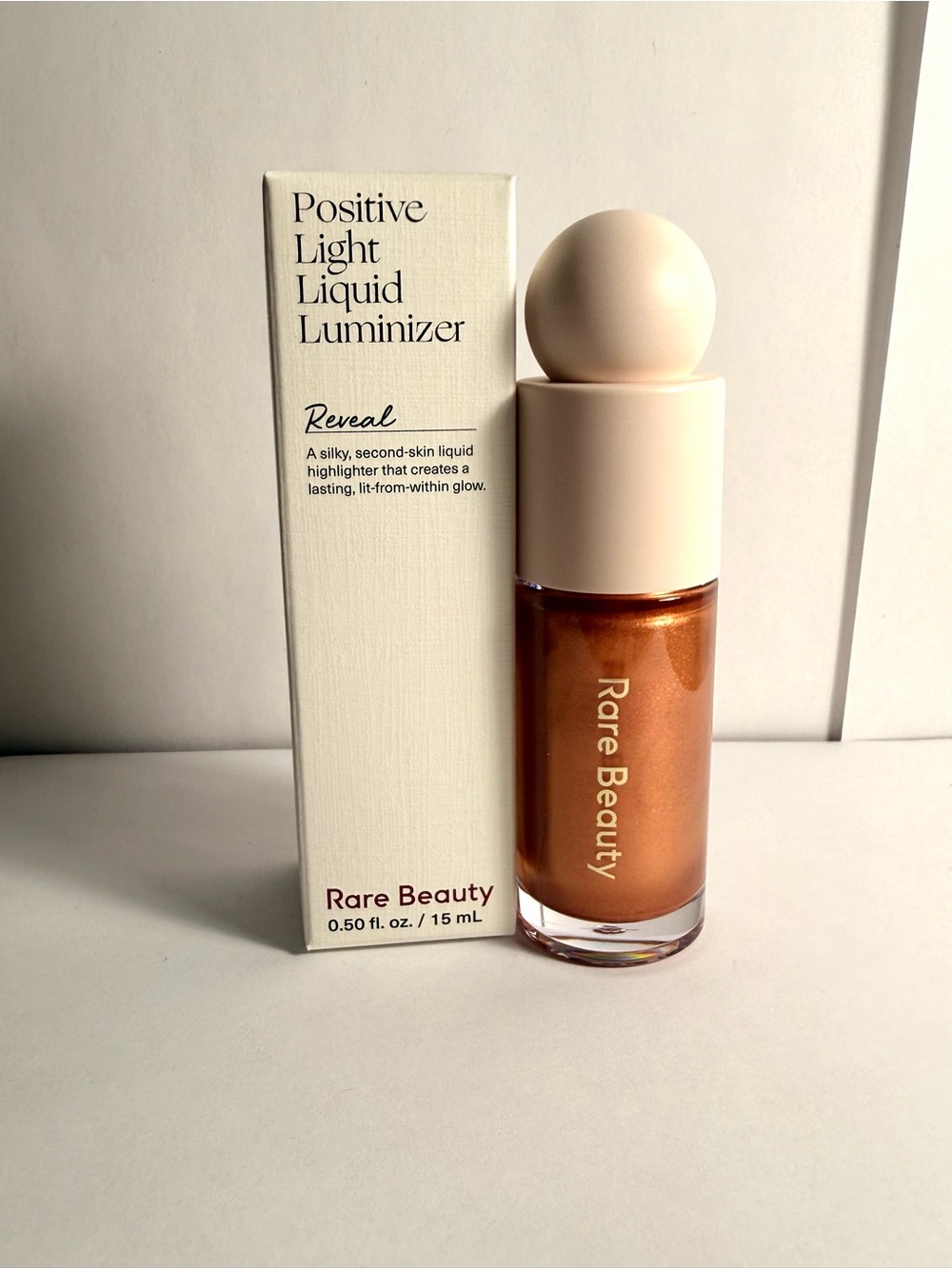 Rare Beauty Positive Light Liquid Luminizer - Reveal